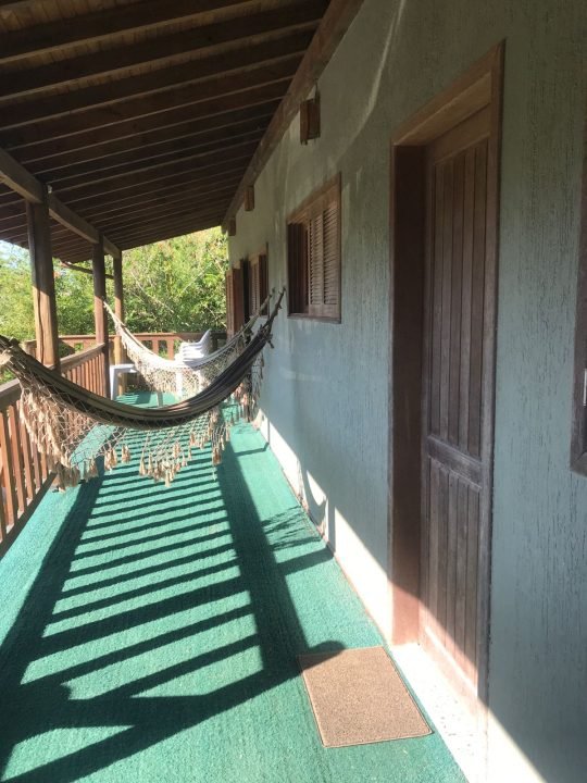 Pousada à venda no centrinho da Praia do Rosa SC!