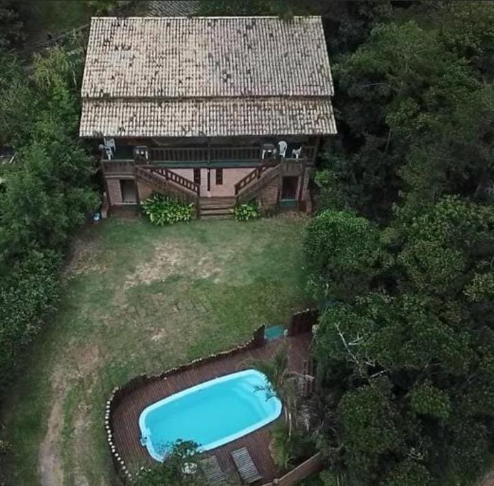 Pousada à venda no centrinho da Praia do Rosa SC!