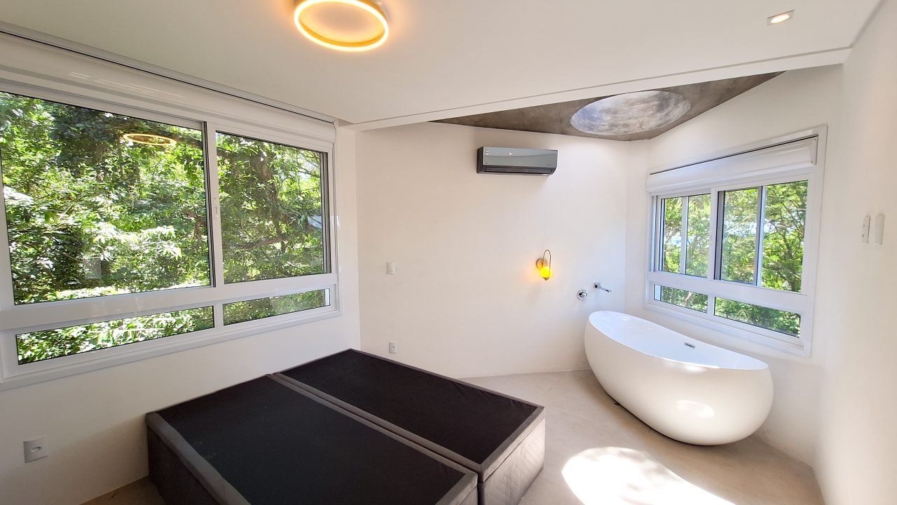 Construtora em Garopaba: Casa com design único no bairro Costa do Macacu Construtora em Garopaba: Casa com design único no bairro Costa do Macacu